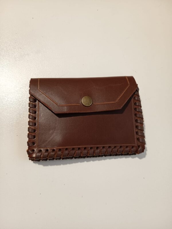 Cartera monedero marrón, Singapur.